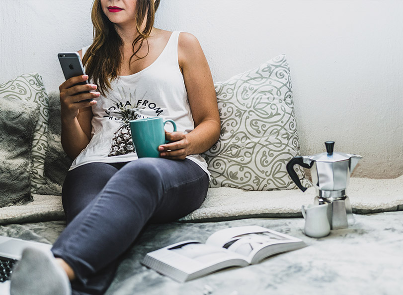 Women on phone ignoring book